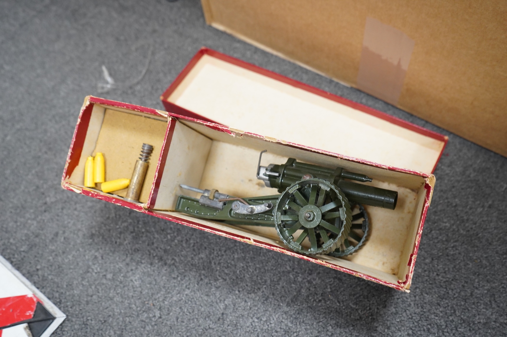 A collection of Britains military soldiers, etc, including two boxed Britains military field guns; an 18” Howitzer (No.2107), and a 155mm Gun (No.2064), both with some accessories and shells missing, an unboxed Bren Gun
